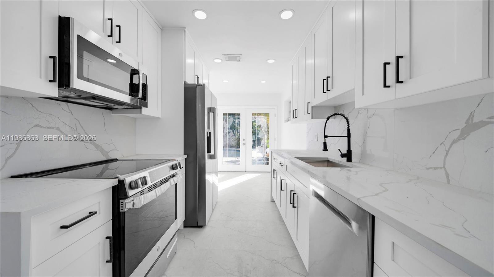 View photos, virtual tours, details... 8850 NE 4th Ave