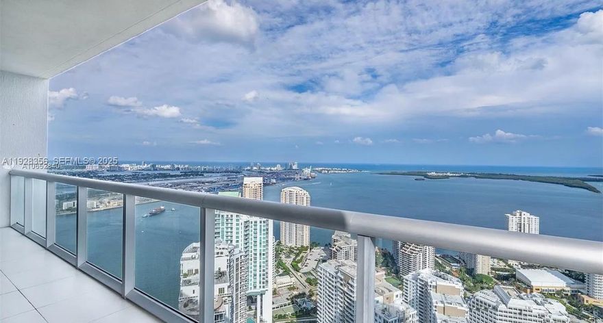 Welcome to Unit 5707, an ultra-high-floor residence offering some of the most indestructible, permanently unobstructed views in all of Miami. Perched on the 57th floor, this home showcases floor-to-ceiling impact glass that frames sweeping views of Biscayne Bay, the ocean, and the Brickell skyline—day and night.

The interior features a bright, open layout with a spacious living area, generous bedroom suite, and a dedicated office/den space perfect for working from home with an inspiring backdrop. Modern finishes, a well-appointed kitchen, and a private terrace elevate the living experience even further.

Located within the world-renowned Icon Brickell, residents enjoy one of Miami’s most impressive amenity collections, including:
       A massive resort-style pool deck overlooking Biscayne Bay
       A full-service spa + fitness center with state-of-the-art equipment
      On-site restaurants and café
      24/7 concierge, valet, and security
     Luxurious resident lounges and relaxation spaces
     Access to the Icon Brickell waterfront promenade
     High-end hotel services within the complex

This is luxury high-rise living at its finest—unmatched views, premier amenities, and the best location in Brickell. Unit 5707 offers the true Icon Brickell experience.