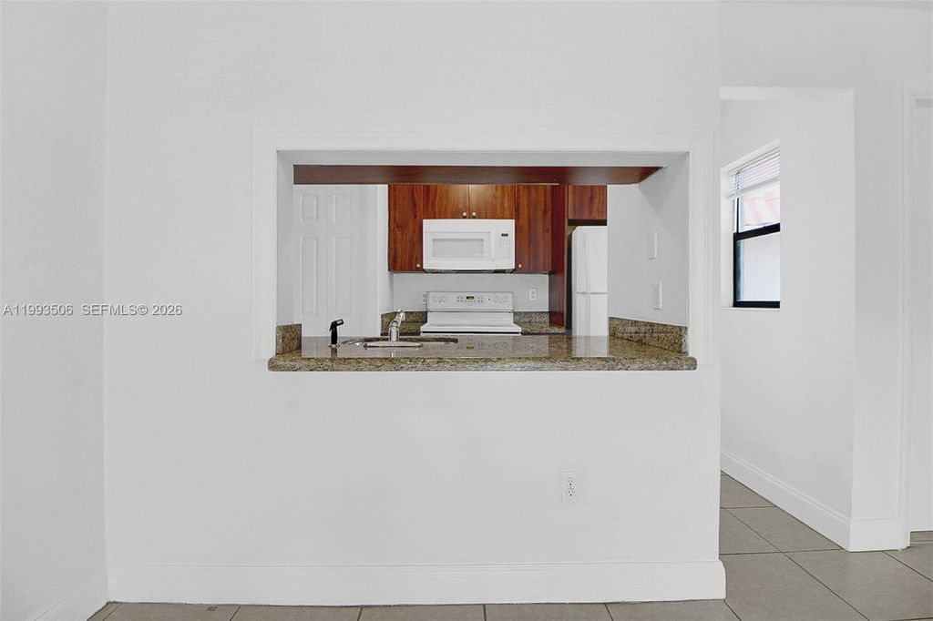 Photo of 9730 Hammocks Blvd #203-28, Miami, FL 33196 (MLS # A11993506)