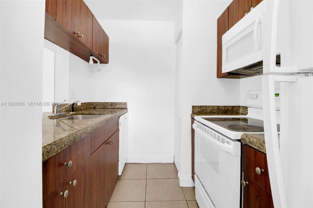 Photo of 9730 Hammocks Blvd #203-28, Miami, FL 33196 (MLS # A11993506)