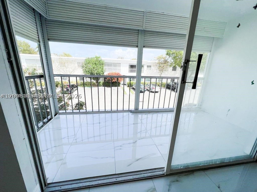 Photo of 6395 Bay Club Dr #4, Fort Lauderdale, FL 33308 (MLS # A12098103)