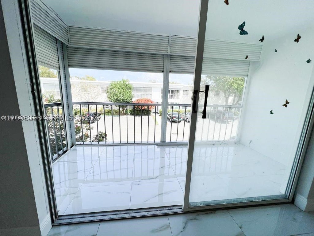 Photo of 6395 Bay Club Dr #4, Fort Lauderdale, FL 33308 (MLS # A12098103)