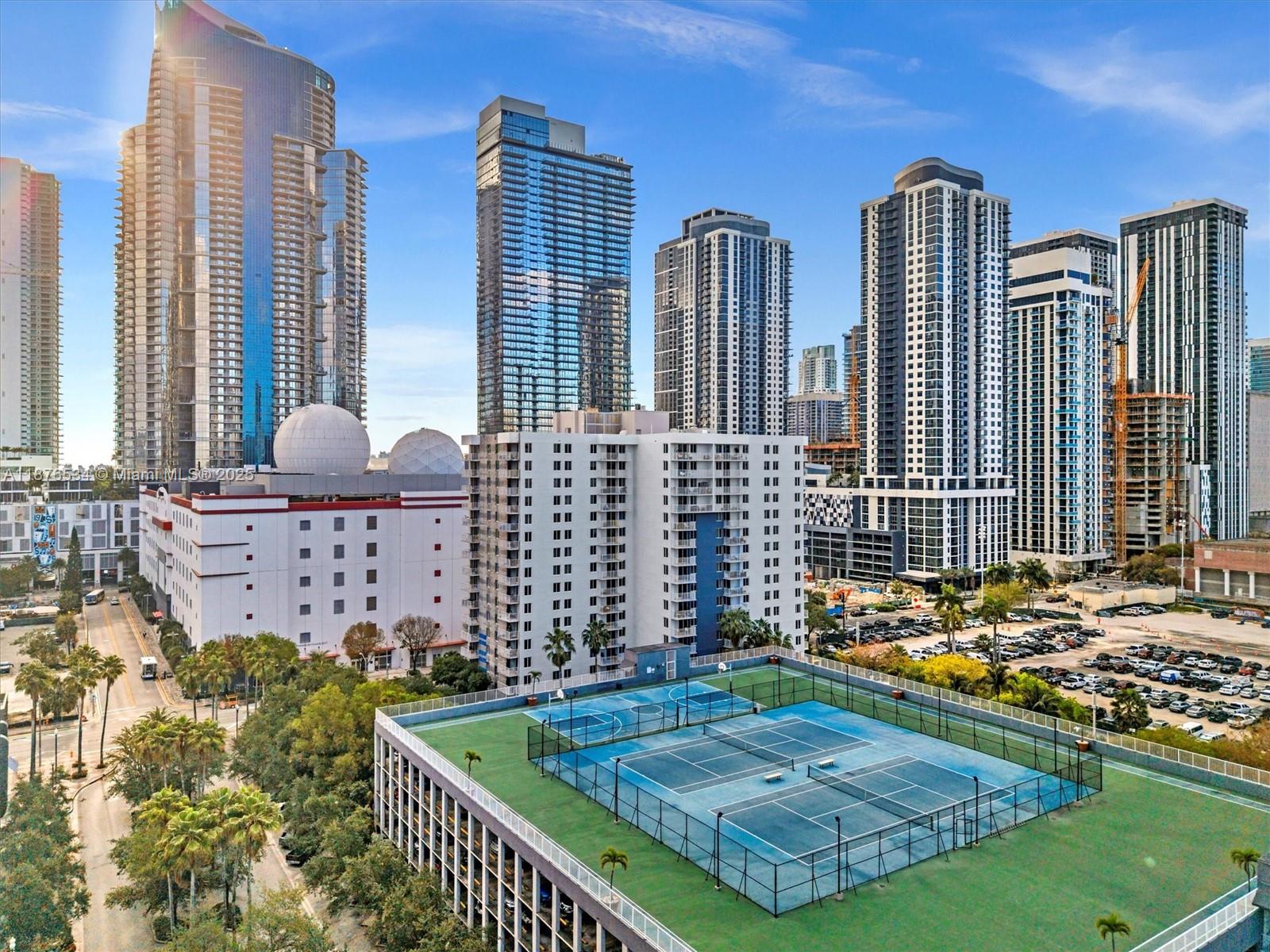 Urban Living at Its Finest – Offered at $370,000!Investor opportunity,Income producing:Great Tenant pays $2850. This stunning 2-bedroom, 2-bath condo puts you right in the heart of the city, surrounded by convenience, culture, and excitement. Enjoy an unmatched lifestyle with resort-style amenities including rooftop tennis courts, a full sport deck with basketball, jogging and walking paths, a modern fitness center, clubhouse,cyber café with Wi-Fi, billiard and poker room, 8-seat private theater, volleyball court, and a luxurious pool with Zen sunning beds. located near MetroRail, the PeopleMover, and Brightline.walking distance of the Kaseya Center, Frost Science Museum, Bayside Marketplace, Target, and Publix. Don’t miss your chance to experience elevated city living!