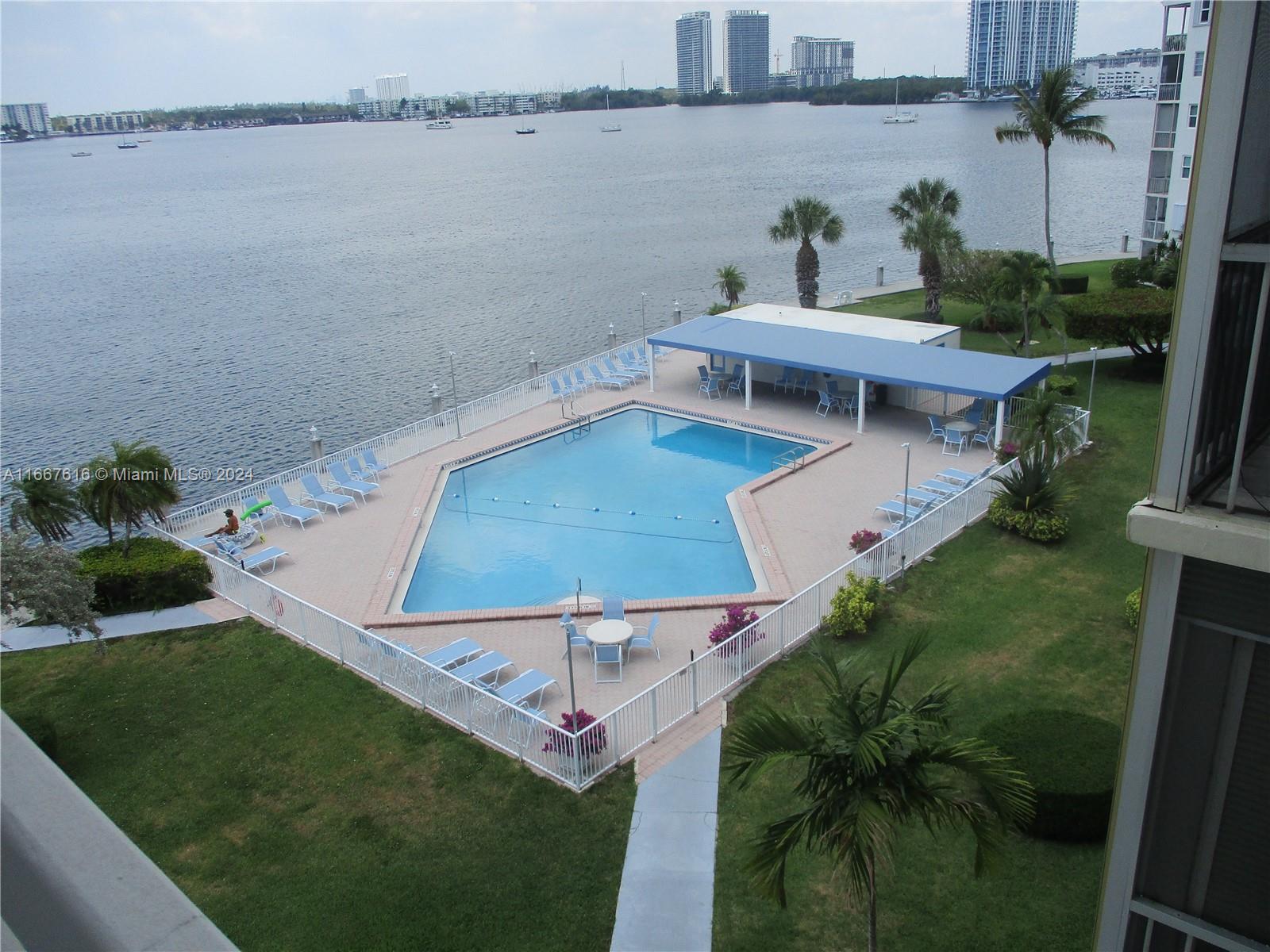 Point East Condominium is a 55+ Active Senior Living Community located in beautiful Aventura, Florida offering beautiful views of Maule Lake & Bay. Unit has spectacular waterfront & pool view from balcony & living room. Kept in very good condition, new paint, new blinds, ceramic floors. Must see. 24 hr Security, Multiple Pools, Gym, Billiard Room, Bocce Court & Saunas, with many activities for residents such as exercise classes, bingo, dominoes, dancing, etc., Residents can walk to nearby exclusive shops & restaurants or take a quick drive to beautiful beaches, Aventura Mall, Bal Harbour Shops & Golf Stream Park & Casino or ride on the Aventura Express Shuttle which conveniently stops in every building. Only Service Dogs with required credentials allowed. No Pet Deposits Required.