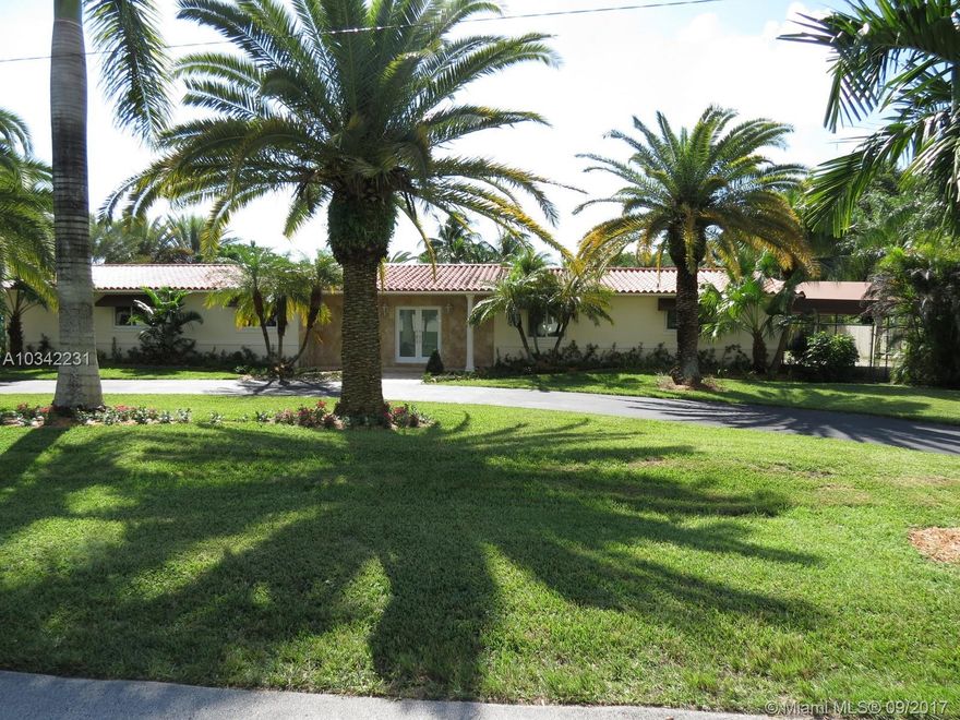 PRICED TO SELL! Amazing Sunset Residence Built on 1.25 Acres! This Beautiful Property Features 5/4, with 5,639 SF, Lot size 54,450.00 SF, Large Living & Dining , Wet Bar, Huge Kitchen, Spacious Master Bedroom, plus Separate in Laws Quarters, Huge Pool & Jacuzzi, 3 Car Garage, Large Circular Driveway, and more! NEW bathrooms and porcelain floors throughout.