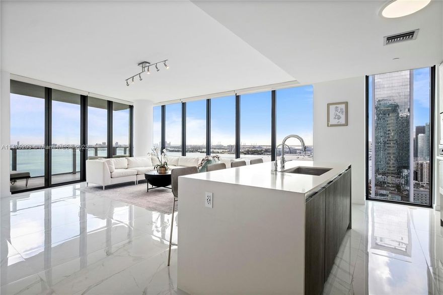 Experience luxurious Miami living at 2900 NE 7th Ave. #2807 in vibrant Edgewater. This 3-bed/4-bath residence, accessed via a private elevator, features high ceilings & impact glass windows for stunning views. The modern kitchen boasts Miele appliances, Italian Snaidero cabinets & eat-in island. White Carrera marble floors enhance the lavish ambiance. Primary suite is a retreat w/breathtaking vistas, en suite bath & walk-in closet. Enjoy amenities like two parking spots, valet service, tennis courts, dog park, waterfront pools, Beach Club, and state-of-the-art gym. Built in 2017, the Biscayne Beach condominium has 51 floors and 399 units. Live moments away from Miami's vibrant scenes, including the Design District, Wynwood Arts District, Downtown, and just minutes from Miami Beach!