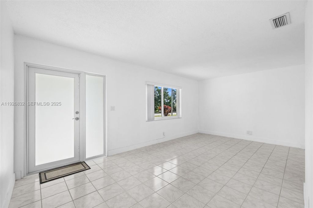 Photo of 3925 NW 19th Ave, Oakland Park, FL 33309 (MLS # A11926832)