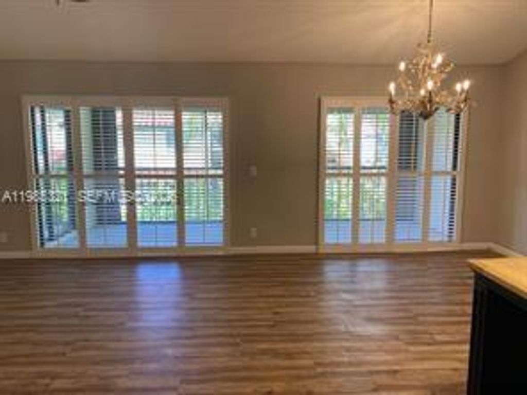 Photo of 23 W Lexington Ln #C, Palm Beach Gardens, FL 33418 (MLS # A11985321)