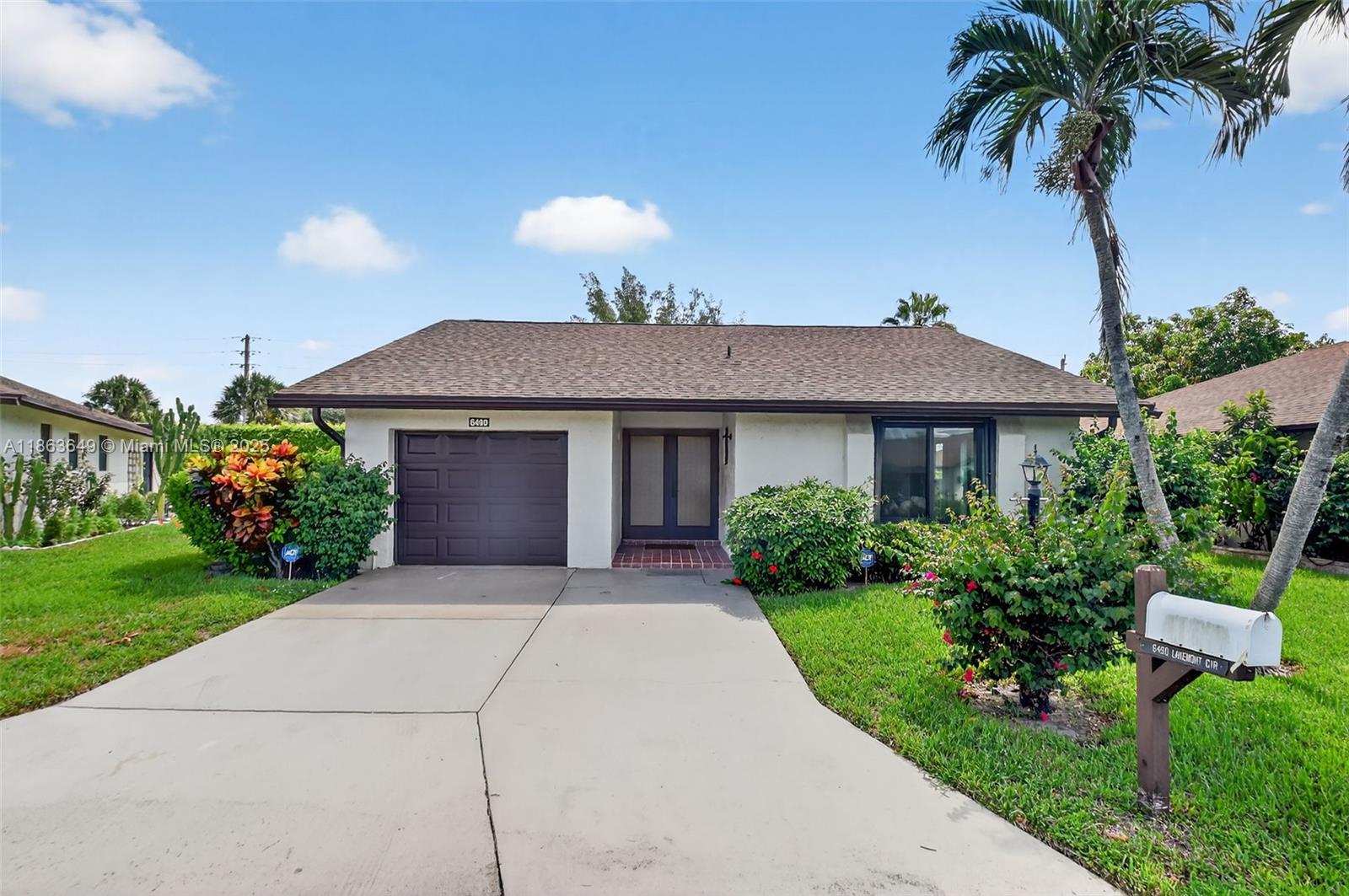 YOUR WAIT IS OVER...... Bright and Airy 2 Bedroom + Florida Room, 2 Bath, 1 Car Garage, "CBS" Home in Sought After BUTTONWOOD EAST at GREENACRES. Features an Inviting Floorpan, Eat-in Galley Kitchen, Spacious Master Suite, Walk-in California Closet, Glass Shower Enclosure, Generous Guest Room, Vaulted Ceilings, Neutral Tile Flooring ***EXPANSIVE ENCLOSED FL ROOM***NEW ROOF***NEW A/C***HURRICANE IMPACT WINDOWS & DOORS*** Accordion Shutters, Central Vacuum & Tropical Landscaping. Active Adult Community with Luxurious Amenities: Clubhouse, Meeting Room, Fitness Center, Billiards, Library, Pool, Jacuzzi, Tennis, Shuffle Board, Bocce, and BBQ Area. LOW HOA Includes Cable TV and Landscaping. Convenient to Shopping, Dining, Entertainment, Beaches, Travel, and more. HURRY - PRICED TO SELL!!!