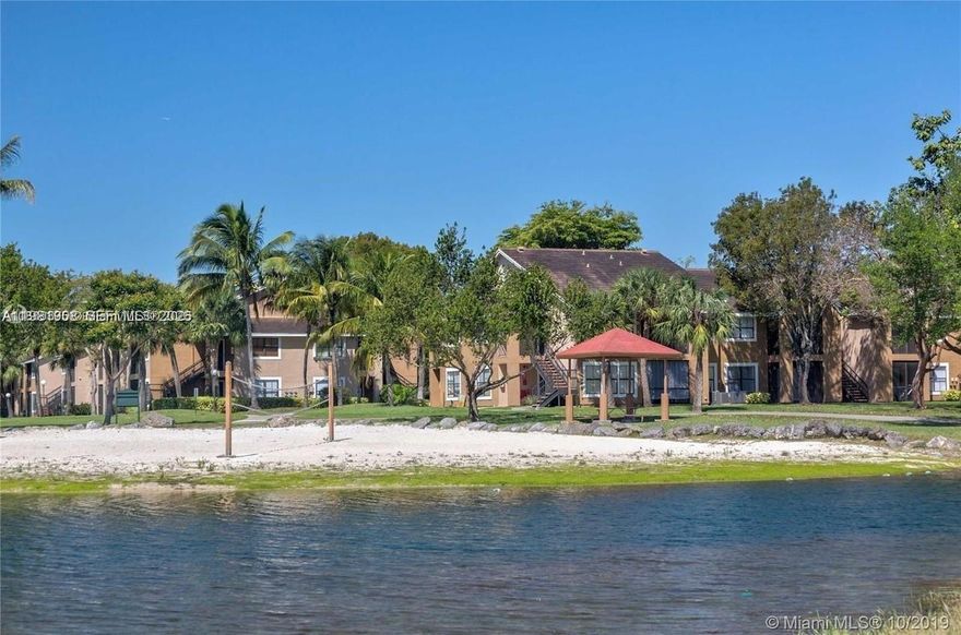 Stunning corner apartment in the gated Vista Lago at Hammocks!  investor welcome, fully renovated with breathtaking lakefront views and private beach access—the perfect spot to unwind after a busy day. This first-floor unit features 2 bedrooms, 2 bathrooms, new flooring, and modern finishes, open kitchen with granite countertop, washer and dryer in unit, plus a screened porch to enjoy the outdoors.  Residents can enjoy 2 assigned parking, recreational areas, a gym, walking and biking paths, a barbecue area, and enjoy Hammocks Clubhouse, and 4 different pools. Pet-friendly and plenty green areas for relax and active lifestyle. Don’t miss this incredible opportunity!  SELLER CONTRIBUTION $2,000 AT CLOSING