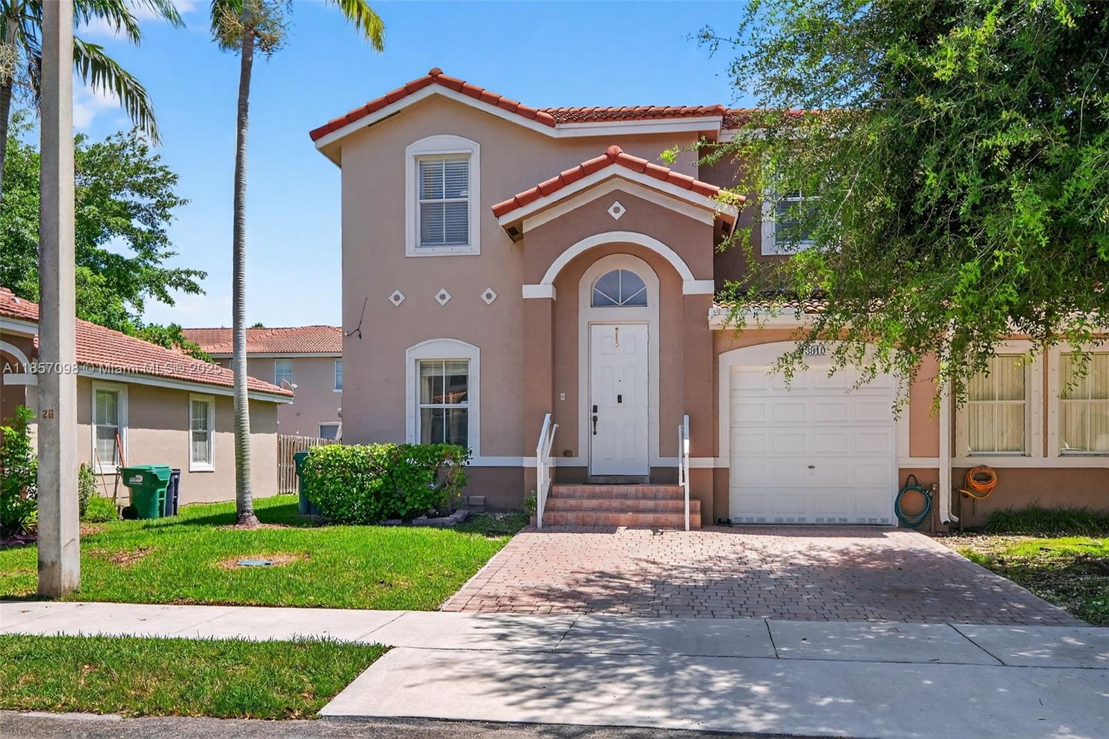 Riverside Villas- Beautiful corner townhome 4 bedroom, 2.5-bath with two-car driveway and one-car garage. Living room filled with natural light, it features a modern kitchen with stainless steel appliances, tile on the first floor, and waterproof laminate upstairs. Ample storage, spacious patio for entertaining, and abundant guest parking. Low HOA with pool, clubhouse, and gated security. Close to top schools, entertainment, and major expressways. Close to Homestead Air Base.