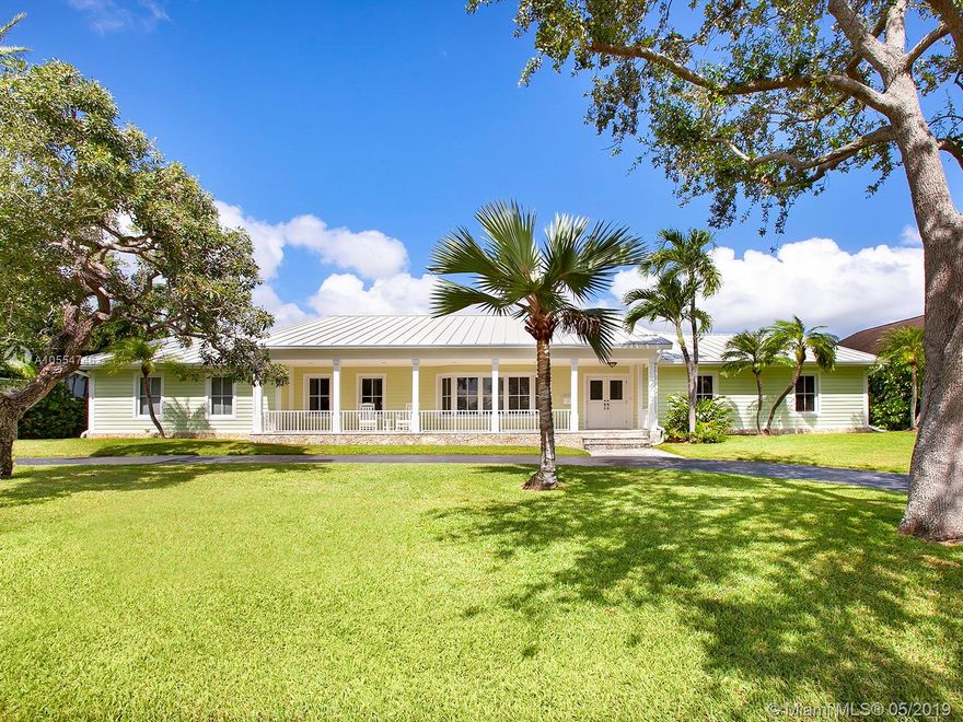 Captivating Key West-style home w/gated Old Cutler Bay waterfront cachet. Completely
renovated by David Landry/David Johnson in 2008. Resilient design, metal roof, impact
windows/doors & porcelain floors make for a SoFla lifestyle of effortless simplicity.
Airy, light-filled, flow-thru kitchen & living areas open to a splendid 55-ft covered
outdoor space w/wide water views bounded by 140-ft seawall w/40-ft dock; 15,000-lb
lift. Generously scaled Master boasts spacious bath, walk-in; water panoramas. Floor-
to-ceiling closets complement ea bdrm. Plus dedicated office, laundry rm, 2-car garage.
Spa adjoins saltwater pool w/reverse heater/chiller system. Just 1 minute to open water
w/no bridges. Postcard-perfect indoor/outdoor waterfront living & a fantastic spot in Old
Cutler Bay!