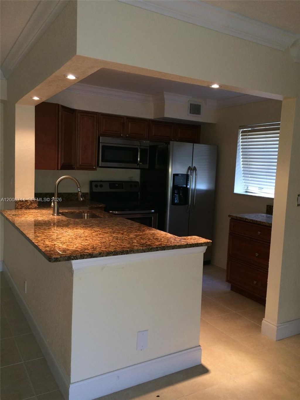 Photo of 407 Gardens Dr #103, Pompano Beach, FL 33069 (MLS # A12008714)