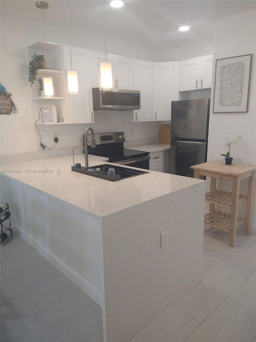 Photo of 600 Layne Blvd #122, Hallandale Beach, FL 33009 (MLS # A11945865)