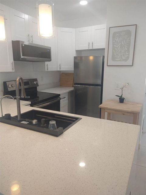 Photo of 600 Layne Blvd #122, Hallandale Beach, FL 33009 (MLS # A11945865)