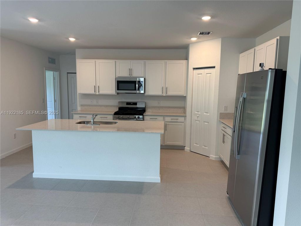 Photo of 5885 NW Sweetwood Dr, Port St Lucie, FL 34987 (MLS # A11922185)