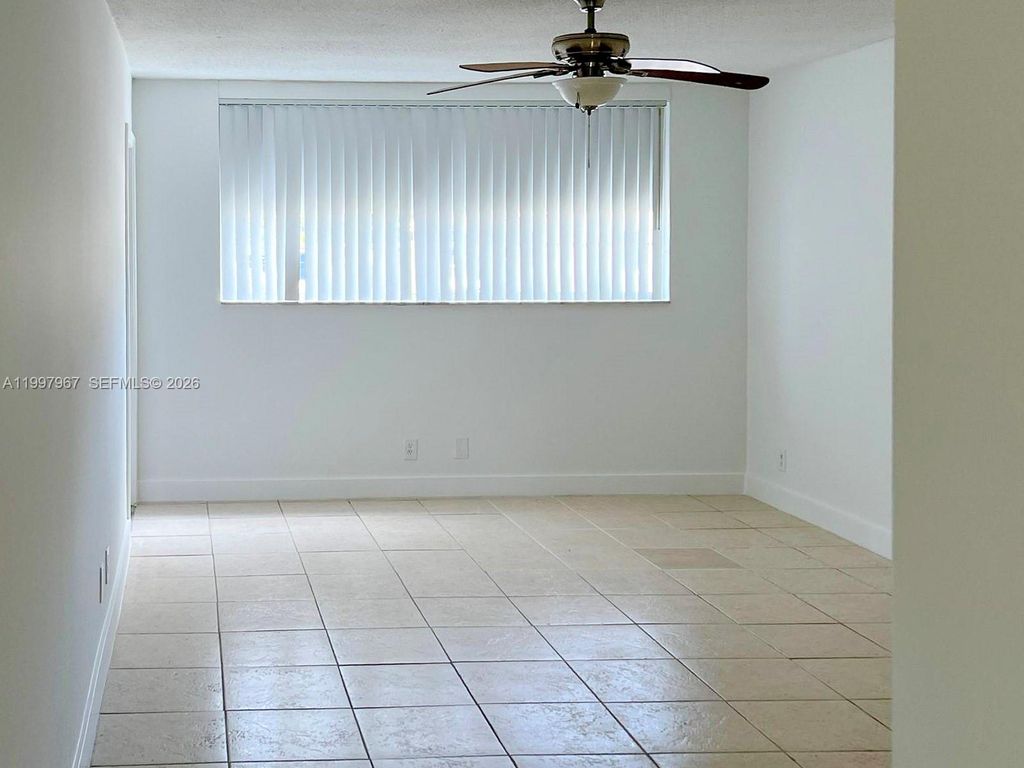 Photo of 211 NE 8th Ave #107, Hallandale Beach, FL 33009 (MLS # A11997967)