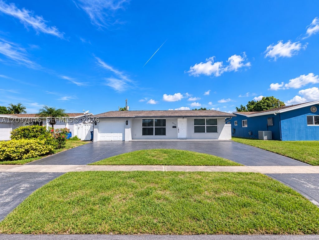 Photo of 8521 NW 25th St, Sunrise, FL 33322 (MLS # A12097046)