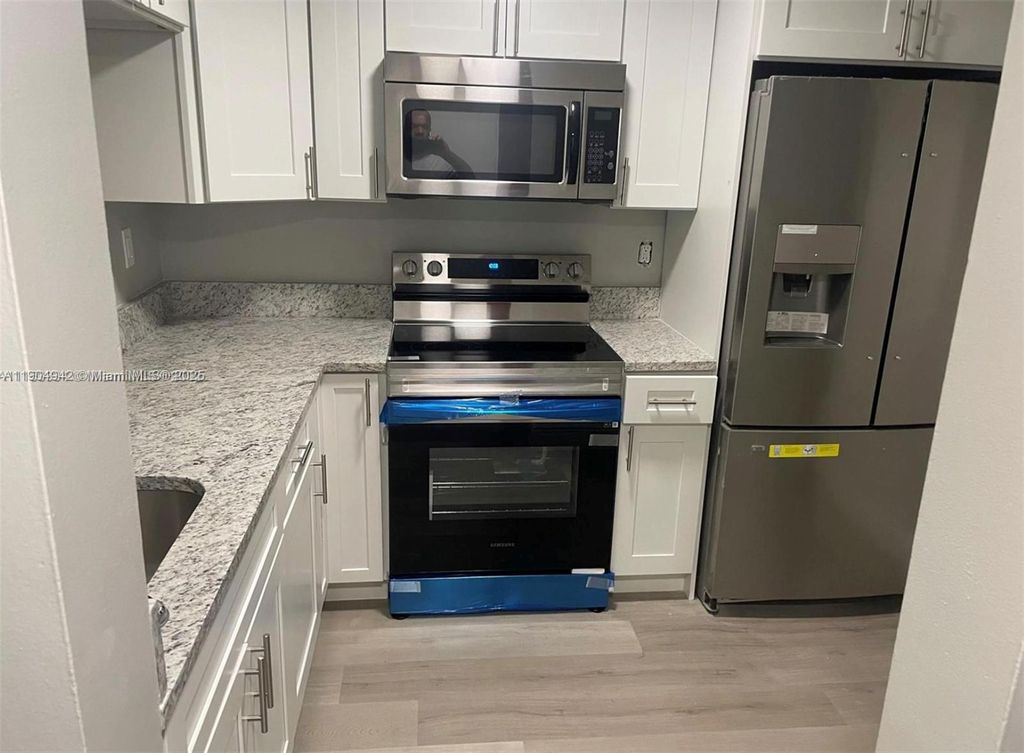 Photo of 3252 Foxcroft Rd #314, Miramar, FL 33025 (MLS # A11904942)