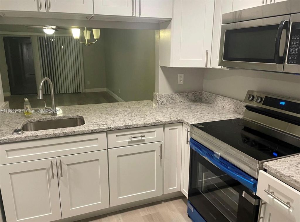 Photo of 3252 Foxcroft Rd #314, Miramar, FL 33025 (MLS # A11904942)