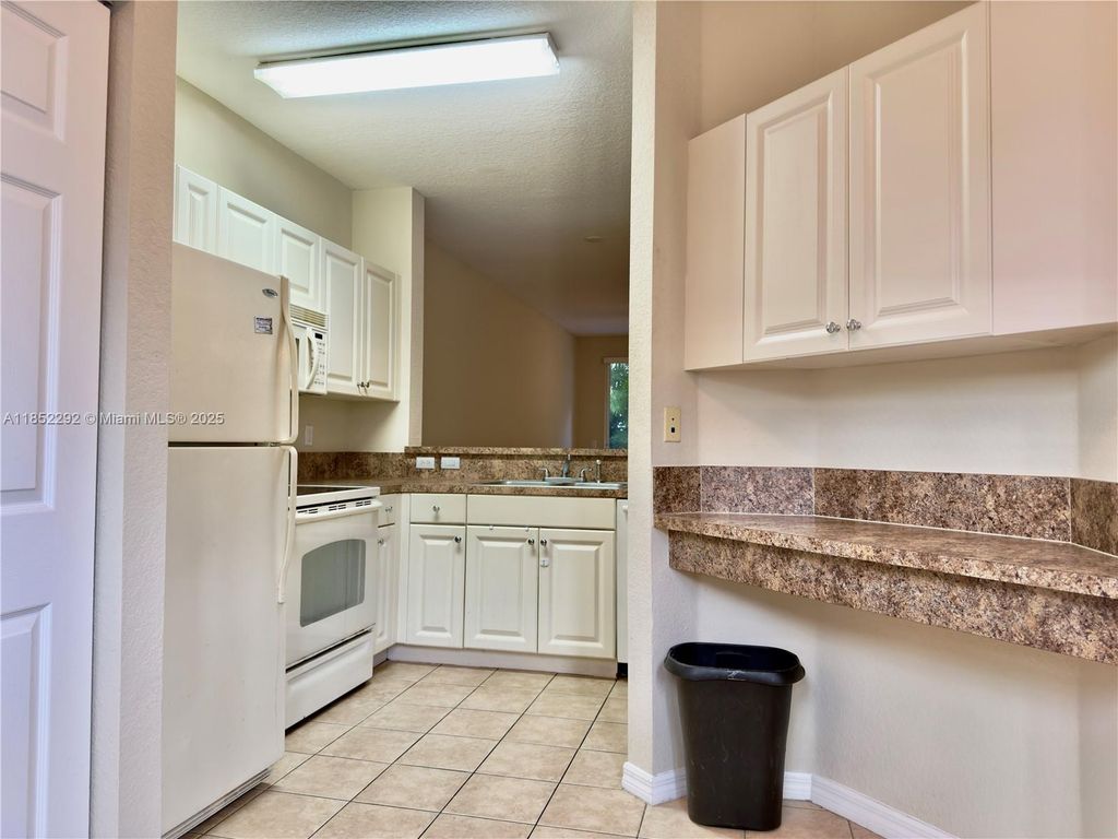 Photo of 1904 Alamanda Way #1904, Riviera Beach, FL 33404 (MLS # A11852292)