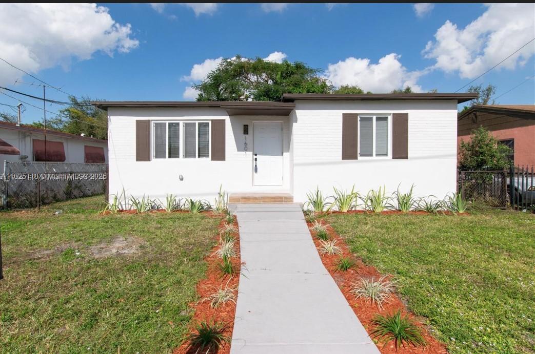 Charming 3-bedroom, 2-bath home completely renovated with new flooring, modern bathrooms, and a gourmet kitchen with stainless steel and quartz. income producing property. Amazing location !