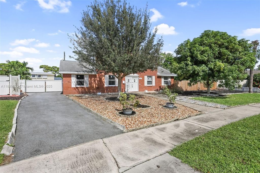 Photo of 917 Orange Dr, Lake Park, FL 33403 (MLS # A11899023)