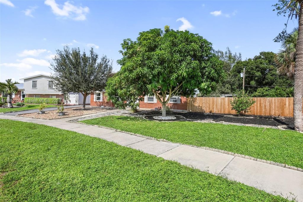 Photo of 917 Orange Dr, Lake Park, FL 33403 (MLS # A11899023)