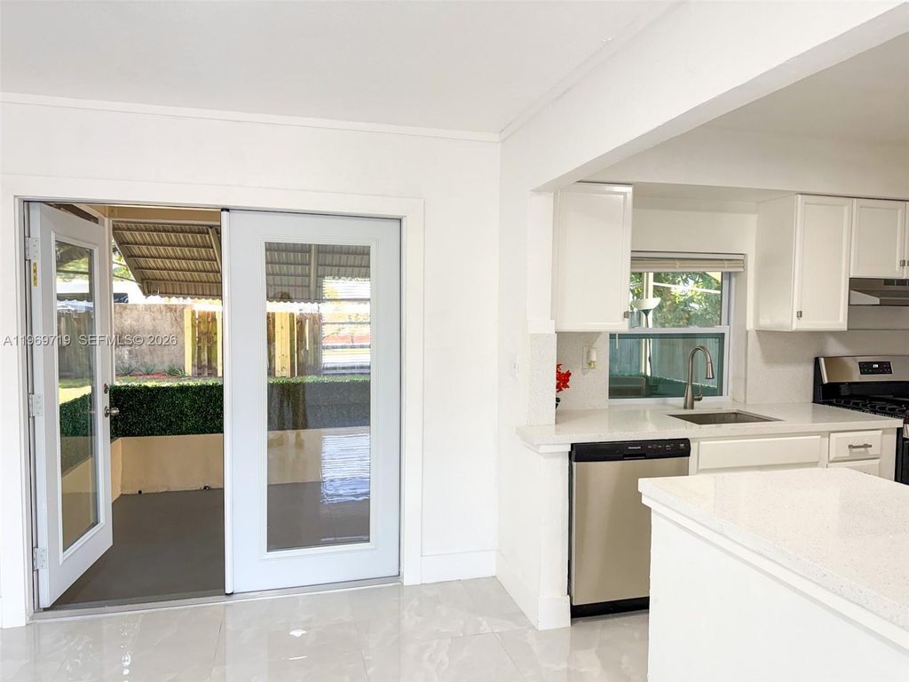 Photo of 7040 NW 24th St #7040, Sunrise, FL 33313 (MLS # A11969719)