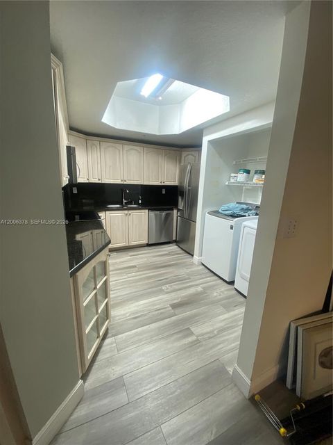 Photo of 17405 NW 75th Pl #107, Hialeah, FL 33015 (MLS # A12006378)