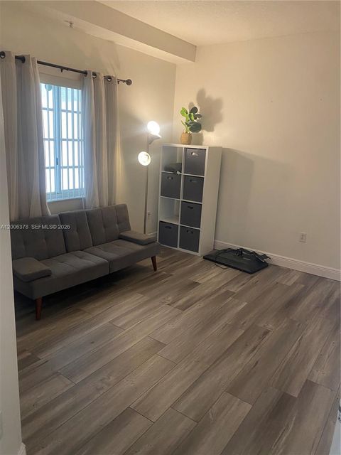 Tiny photo for 17405 NW 75th Pl #107, Hialeah, FL 33015 (MLS # A12006378)