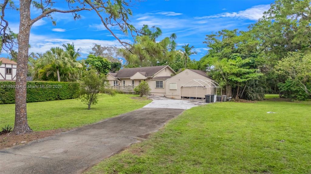 Photo of 5310 NW 79th Way, Parkland, FL 33067 (MLS # A11889214)