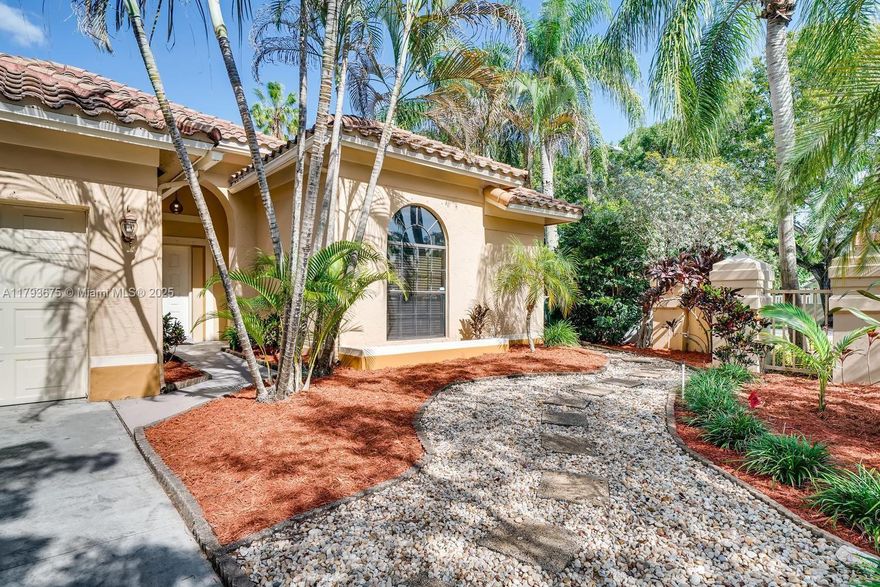 Beautiful home with stunning backyard pool and amazing secluded personal covered patio. Perfect for entertaining and relaxing by the pool! Floor to ceiling windows provide phenomenal natural light. Bedroom has a wonderful view of the pool and patio doors that open directly to it. This home is in immaculate condition and has been recently updated. The kitchen has gorgeous granite counter tops, modern cabinetry, and a great hood vent. The bathrooms have been recently updated. Spacious 2 car garage and great mature landscaping in the front yard complete with a great walkway to the backyard oasis. newer roof,  hot water heater, new pump for the pool, air conditioning and other updates