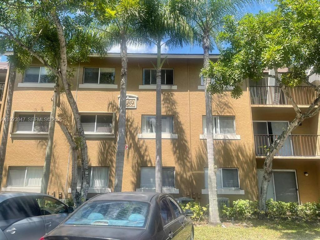 Photo of 1089 N Benoist Farms Rd #107, West Palm Beach, FL 33411 (MLS # A11923947)