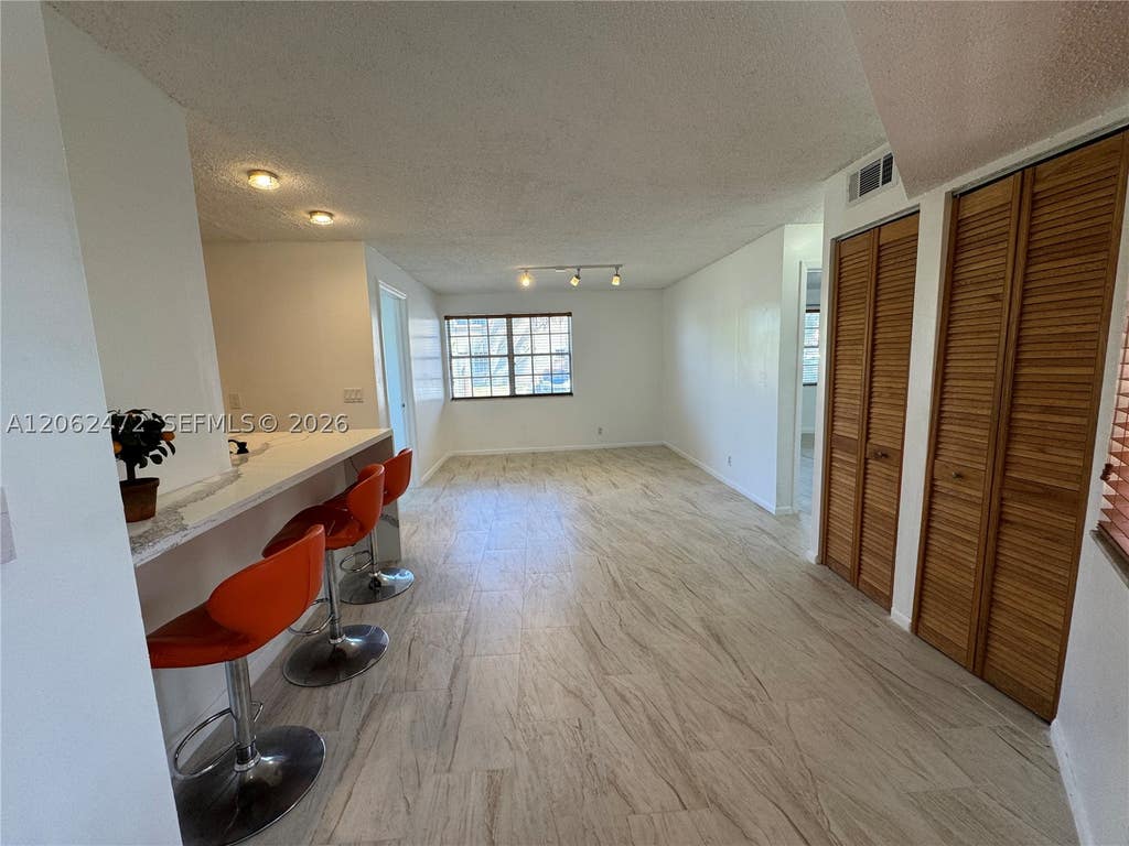 Photo of 8630 SW 3rd St #101, Pembroke Pines, FL 33025 (MLS # A12062472)