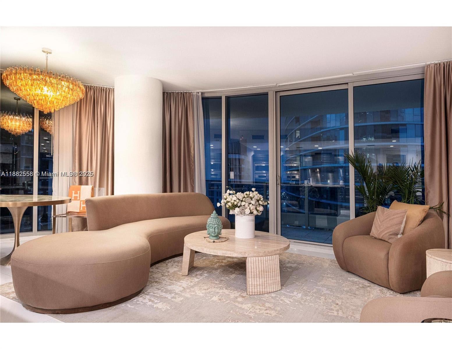 Corner unit, High ENd FURNISHED ....Rare layout with floor-to-ceiling windows, porcelain white glass floors, and a 330 sq.ft. marble wraparound terrace with panoramic 180° views of the Intracoastal, Biscayne Bay, and Miami skyline. Each bedroom has a private balcony. Master Suite: Greek-style Jacuzzi tub, rain shower, walk-in closet
Living Room: High-end seating in natural wool, complemented by curated natural stones, bronze mirrored accents, and premium RH outdoor furniture. Sub-Zero refrigerator/freezer with ice maker, Miele flat cooktop, stainless steel Miele electric oven, washer/dryer in-unit. Epic Hotel & Residences features resort-style pool, Exhale Spa, Technogym fitness center, 24-hour concierge, valet, in-residence dining, restaurants Zuma and Area 31, access to Epic Marina.