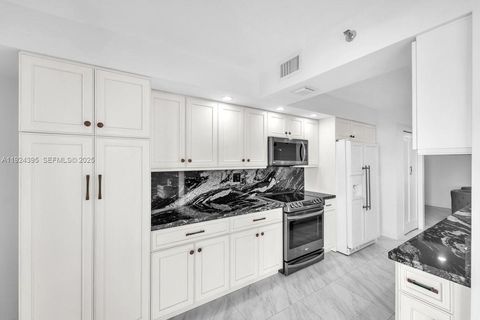 Photo of 4000 Towerside Ter #1807, Miami, FL 33138 (MLS # A11924395)