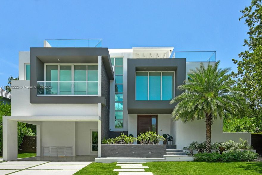One of the only contemporary homes available for occupancy now on the Key. Custom built to perfection in 2016 by renowned Architect Pedro Infante and design team IG Group. It is a 5 bed 5 & 2 half bath true masterpiece. Topped w/ European and Spanish finishes, including Italian Porcelain floors/counters, Gaggenau/Bosch appliances.  This tri-level home has spectacular views from its roof top terrace. High volume ceilings and floor to ceiling impact windows bring in tons of light. The smart home is equipped w/ everything including iPads that control the entirety of the Savant home. Every room has its own ensuite bath and walk in closet. Covered parking with EV charging station. Outdoor spaces designed to be integrated for entertaining complete with a summer kitchen overlooking infinity pool.
