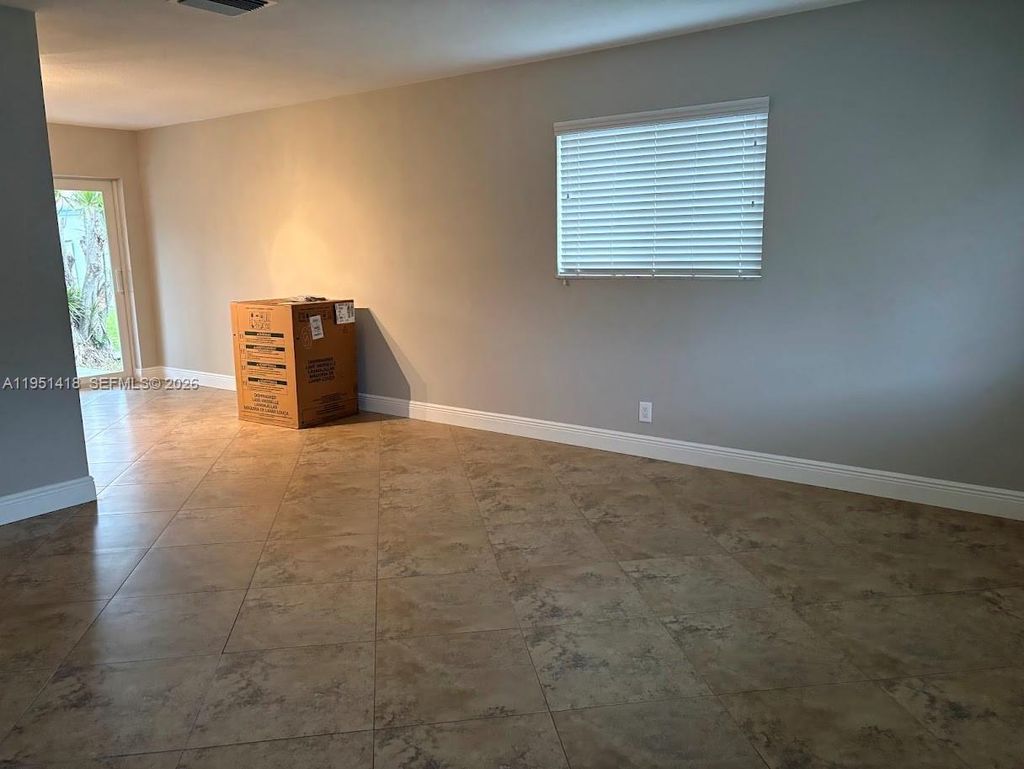 Photo of 7305 NW 57th Ct, Tamarac, FL 33321 (MLS # A11951418)