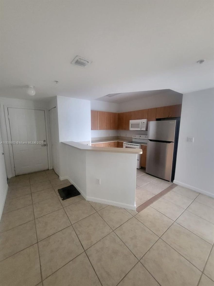 Welcome to Vedado Apartments in the heart of Miami! This stunning 2-bedroom, 2-bathroom unit boasts a spacious layout with tile flooring throughout, a washer and dryer inside unit, a private balcony offering breathtaking views of the iconic Brickell city skyline. With a community pool, gym, and 1 car garage parking space, this condo has everything you need. Located just minutes away from the vibrant Brickell and downtown Miami areas, you'll have easy access to the city's best restaurants, shops, and entertainment venues