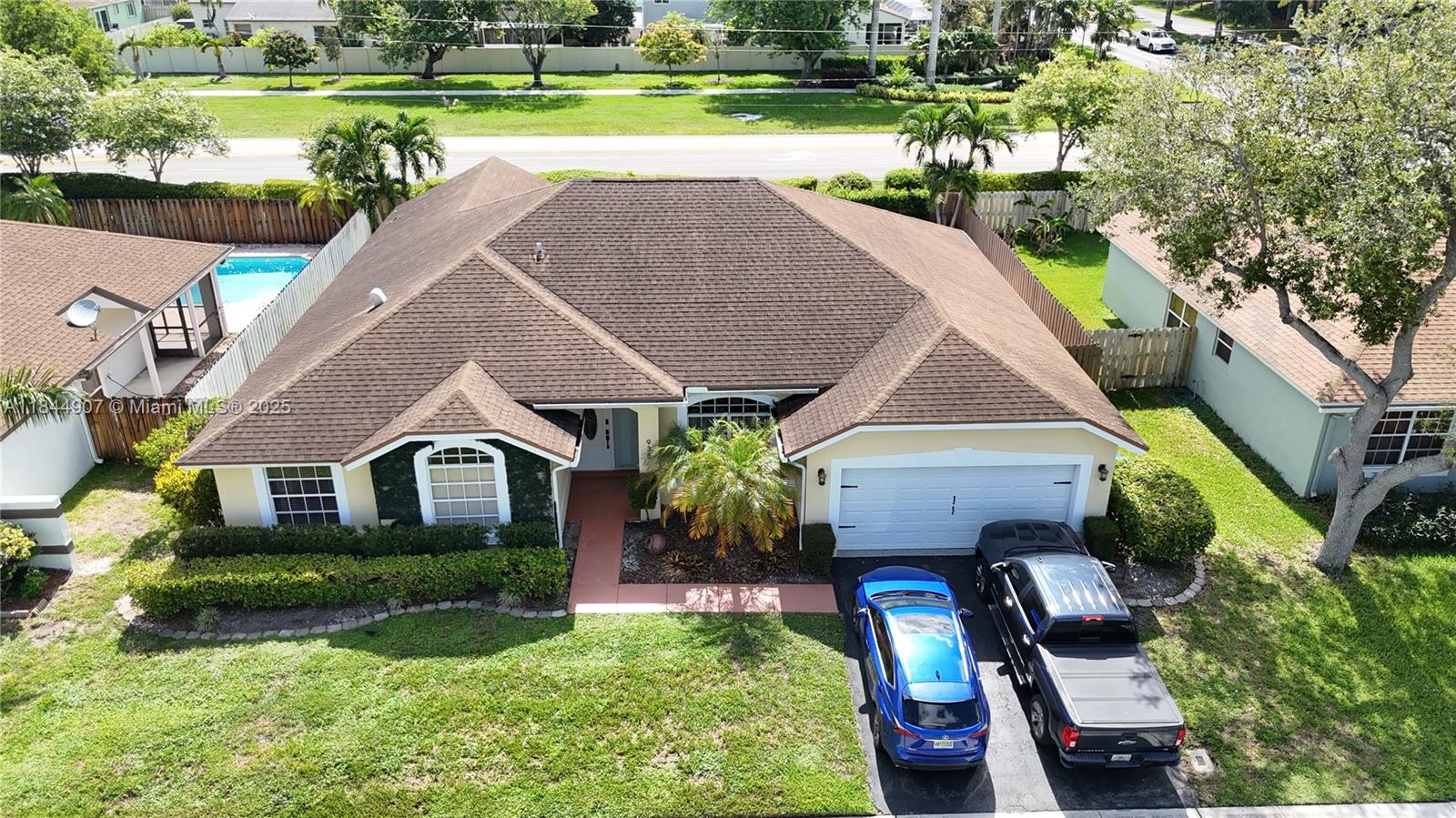 Come see this beautifully-upgraded 4/2 pool home in a family-friendly neighborhood of New River Estates zoned for top-rated schools on the "excellent" list. Features soaring vaulted ceilings, open-concept remodeled kitchen with granite countertops and SS appliances. You will love the stylishly renovated bathrooms! Enjoy a private pool and spacious screened-in porch in fully fenced yard. No rear neighbors- just direct gated access to sidewalk behind the property. No HOA approval needed. Two-car garage w/epoxy floors and thermal barrier padding on door for climate control. Minutes from Sunset Park, Sawgrass Sanctuary, and Weston Town Center, Family Farms, and walking trails. Great suburban area that offers tranquility combined with accessibility. FEMA X zone.