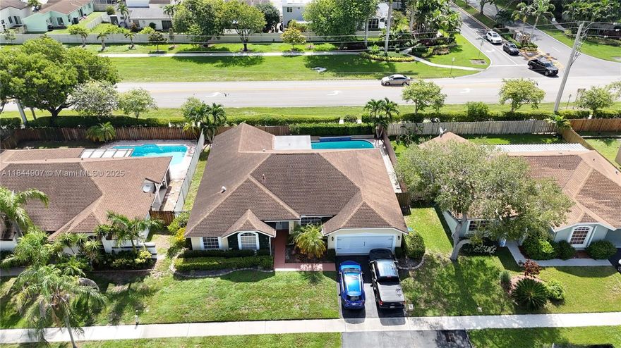 If you are looking for a 4/2 pool home with a double car garage in a great family neighborhood zoned for excellent schools, come see this immaculate house in New River Estates with over 2000 sq. feet living area.   No rear neighbors--just direct gated access to sidewalk behind the property.   No HOA approval needed.  Rooms and bathrooms are tiled and common areas have wood laminate.  Two-car garage has beautiful epoxy floors and thermal barrier padding on impact door for climate control, a separate side entrance and central air AC vent.   Two air conditioners for this spacious home.  New owners will have an American Home Shield Warranty for one year.   FEMA No flood X zone.