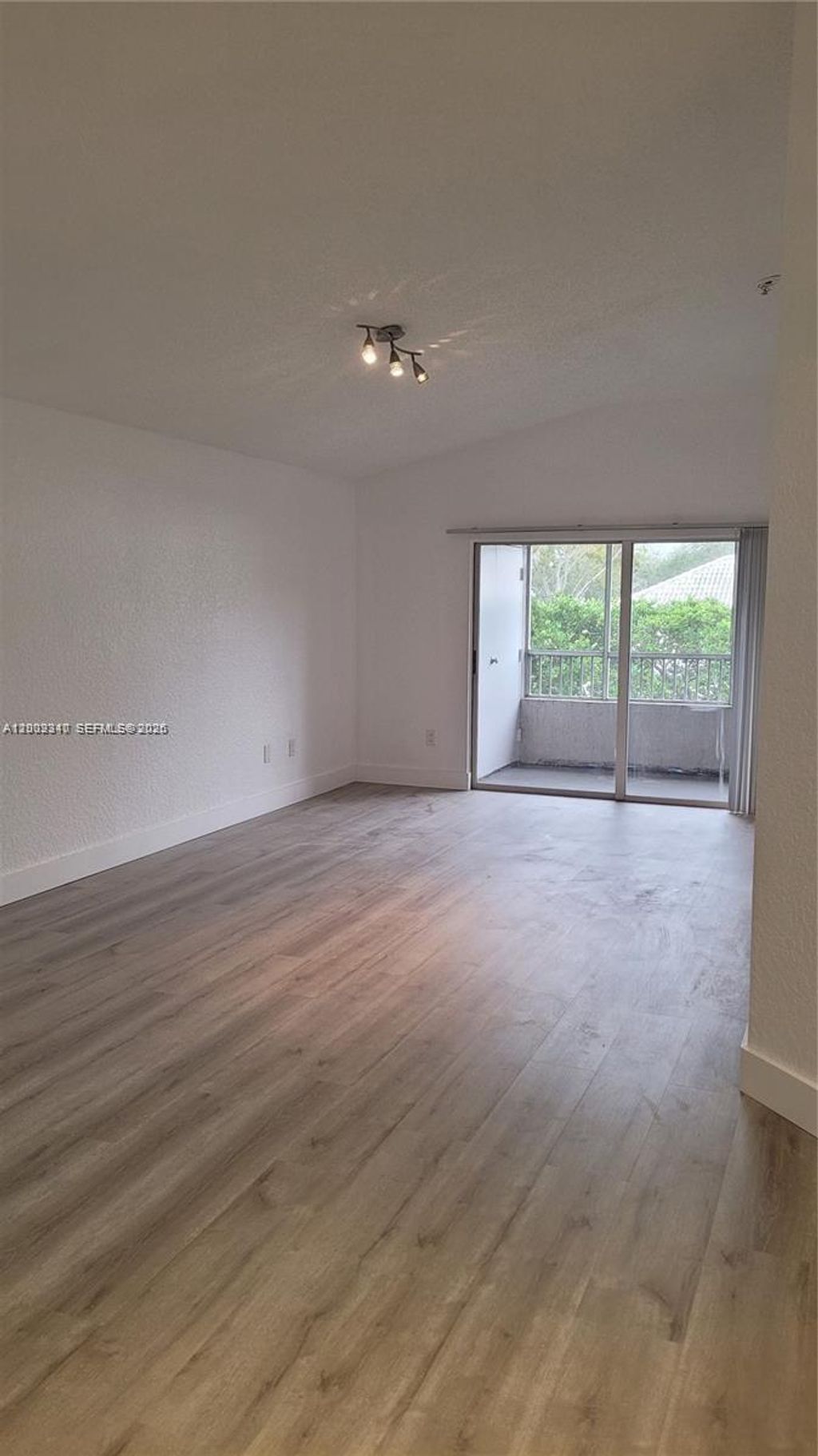 Photo of 2851 N Oakland Forest Dr #210, Oakland Park, FL 33309 (MLS # A12002340)