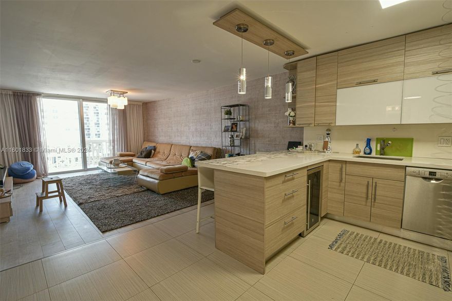 Prime Location: This fantastic 1 bed, 1.5 bath, Completely renovated kitchen with Bosch appliances, condo is
situated in the heart of Hallandale, just steps away from the beautiful beachfront. Enjoy the convenience of
beachside living with breathtaking views right from your balcony. This condo offers a contemporary living
experience with its spacious layout and stylish design, Residents will appreciate the convenience of assigned
parking near the entrance, as well as ample guest parking for visitors. Basic cable and water services are included,
adding to the ease of living in this well-maintained building