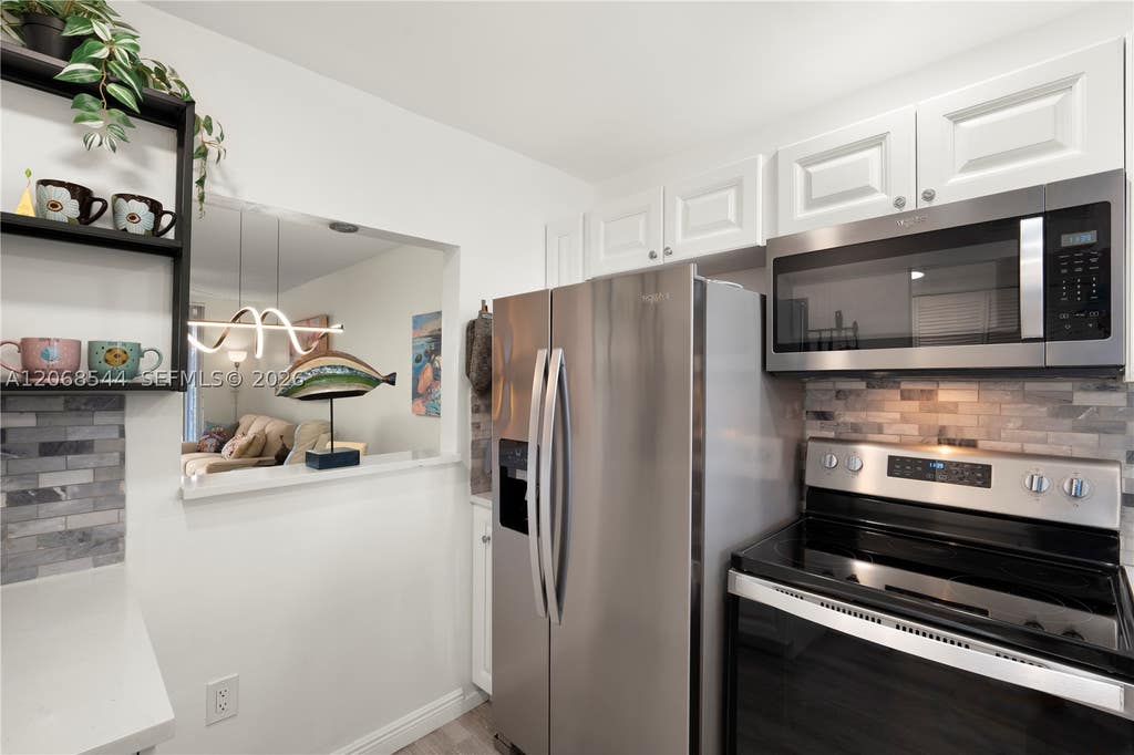Photo of 6750 Royal Palm Blvd #107E, Margate, FL 33063 (MLS # A12068544)