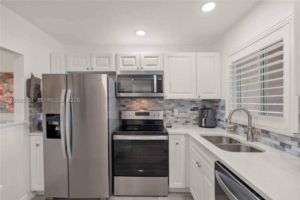 Photo of 6750 Royal Palm Blvd #107E, Margate, FL 33063 (MLS # A12068544)