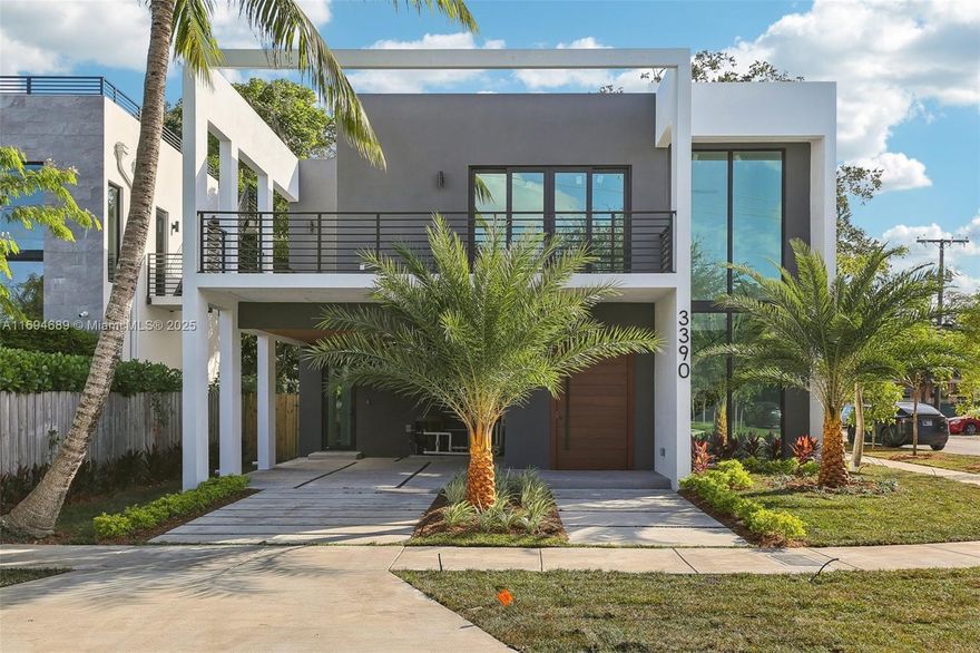 Stunning new construction 4-bedroom, 5-bathroom home in one of Miami's most sought-after neighborhoods. Boasting 4,081 sq. ft. of living Area, this residence is spacious and designed for comfort. The first floor features a bright foyer, open-concept kitchen, pantry, dining, living area, guest bedroom, and full bath. Step outside to a private oasis with a spacious jacuzzi and cabana bath. The second floor boasts 3 bedrooms, 3 bathrooms, huge balconies, and a large terrace off the master bedroom to enjoy views of the trees and nature. Designed with high-end finishes, Low-E windows for energy efficiency, and custom closets. Walk to Center Grove's movies, dining, shops, parks, and A+ schools. With 2 carports, this home perfectly blends tranquility and urban convenience.