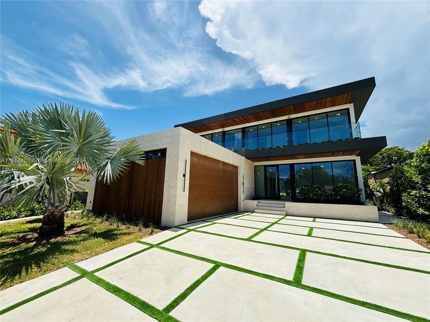New Construction: Unique Opportunity on the Prestigious Miami Beach Golf Club. This exceptional home is situated on a sizable 0.22-acre lot within the exclusive Miami Beach Golf Club. Offering approximately 4,821 sq ft of living space, this residence features 5 spacious bedrooms, 5 bathrooms, and a powder room, all designed with no expense spared.
Every detail of this home exudes sophistication and elegance, with top-of-the-line materials and custom finishes throughout. The property includes expansive family rooms, a 2-car garage, a state-of-the-art Vavenzi kitchen, and Mia Cucina vanities.
This incredible new construction will be ready for occupancy in August 2024.