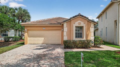 Photo of 1281 NW 170th Ave, Pembroke Pines, FL 33028 (MLS # A11982464)