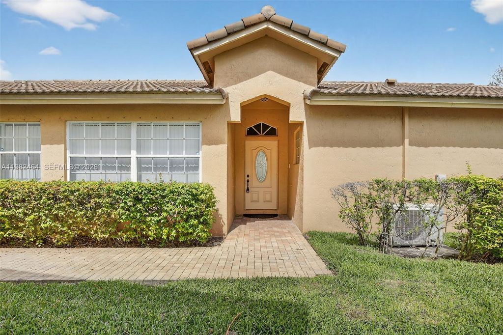 Photo of 1281 NW 170th Ave, Pembroke Pines, FL 33028 (MLS # A11982464)
